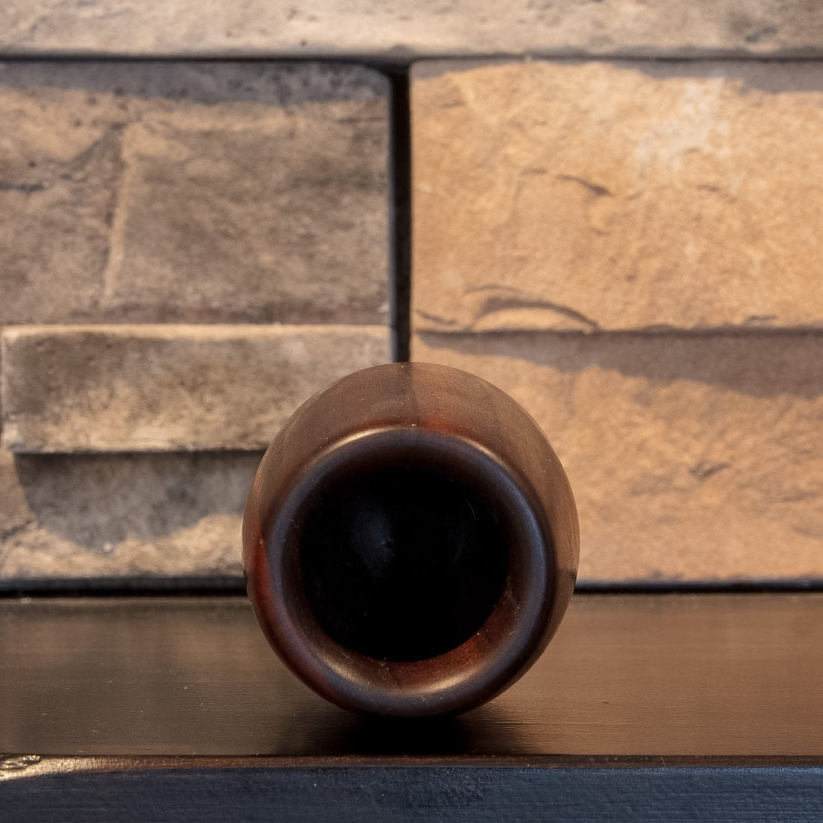 Top opening of The First Lesson Eastern Redbud shot glass showing rounded rim and deep dark interior