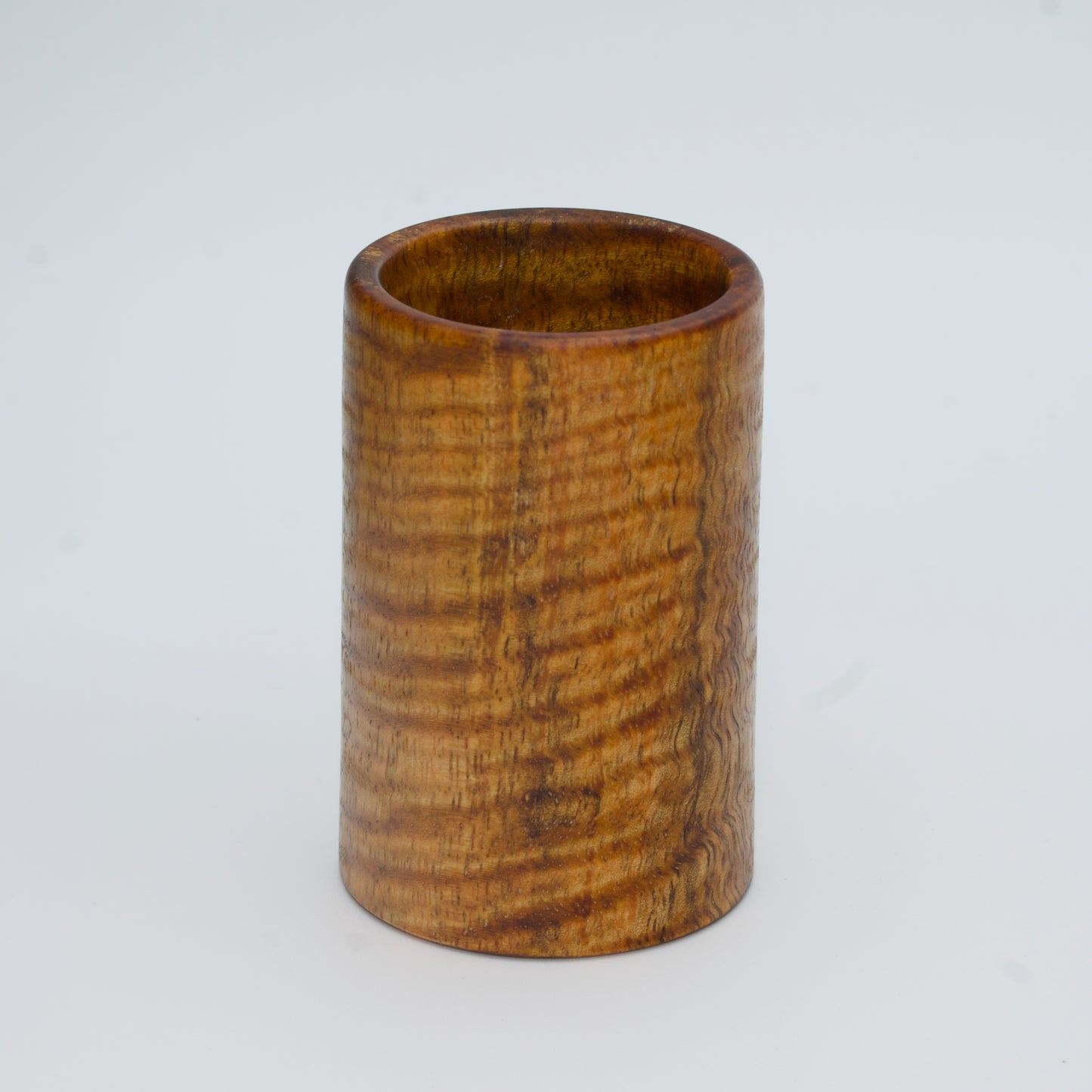 Magno wood shot glass against white background
