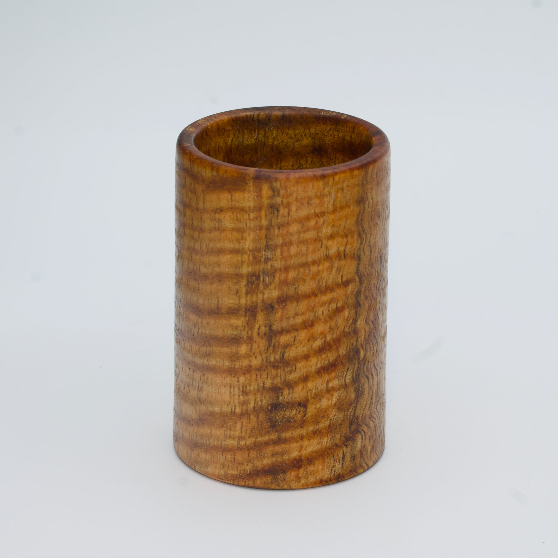 Magno wood shot glass against white background