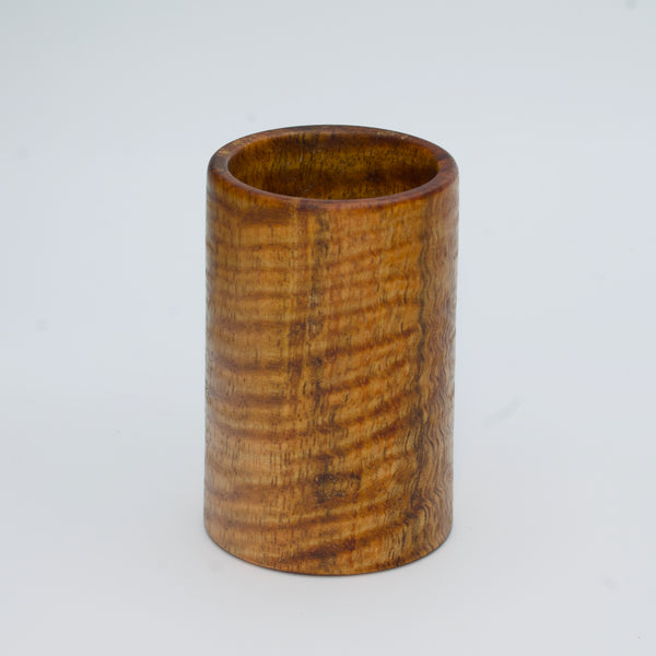 Magno wood shot glass against white background