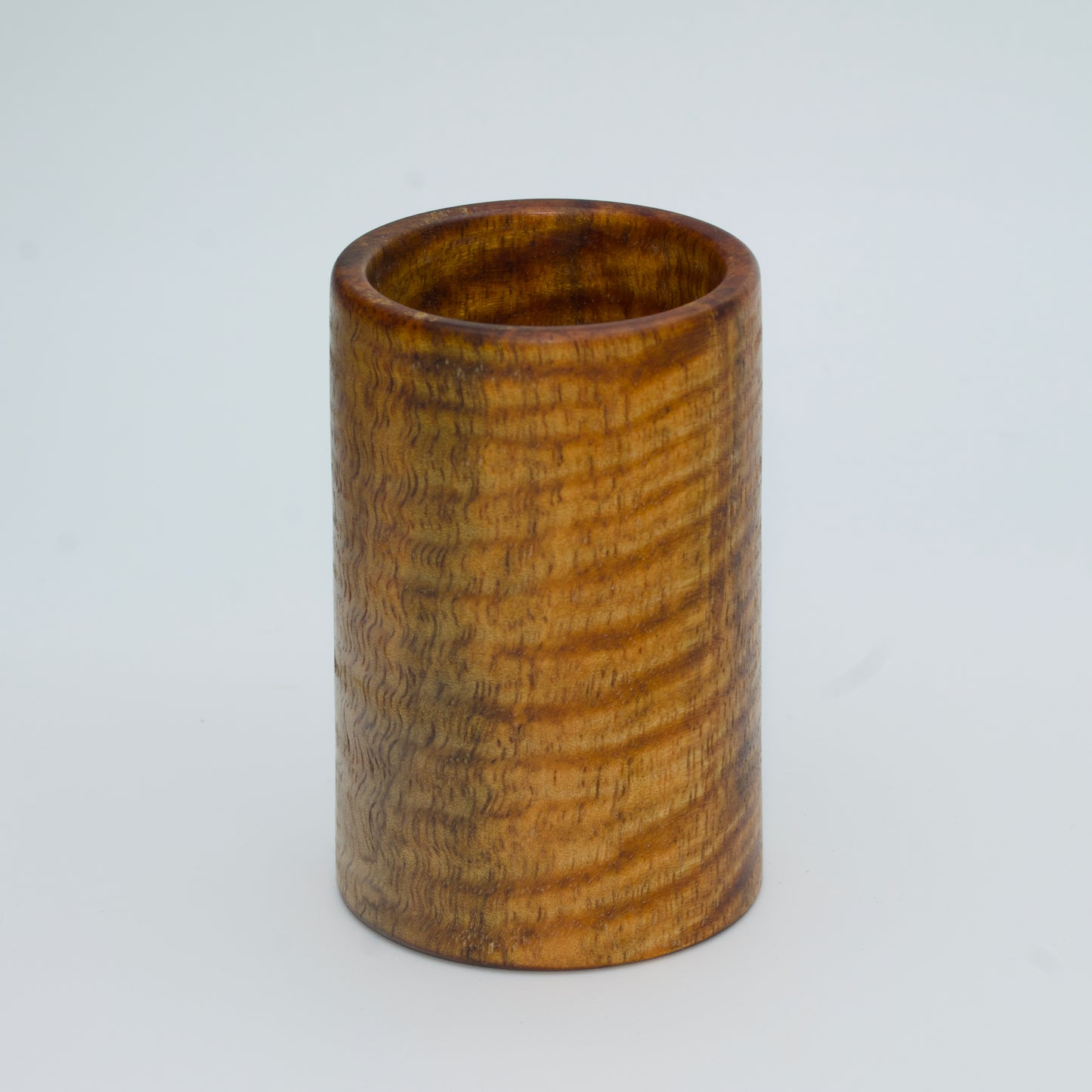 Magno wood shot glass against white background