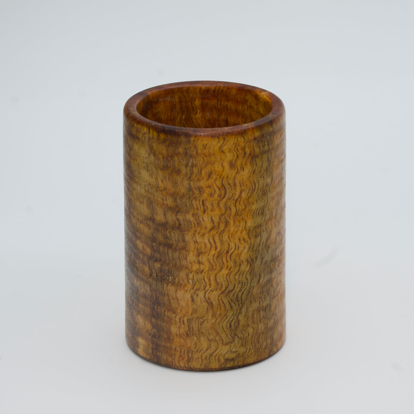 Magno wood shot glass against white background