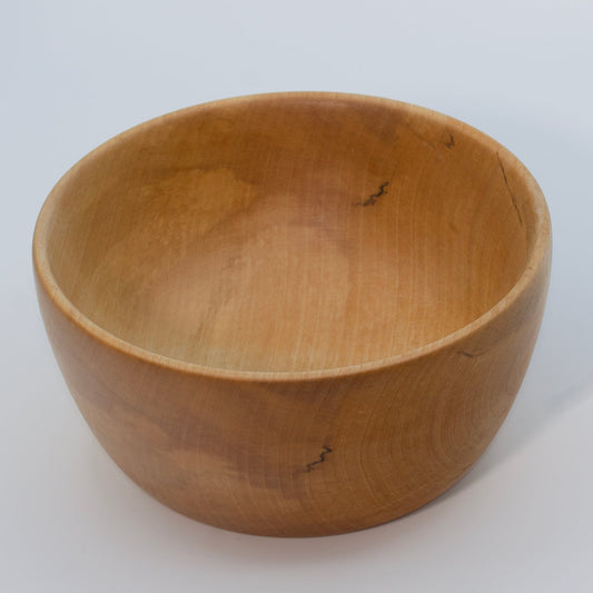 Wooden bowl on a white background
