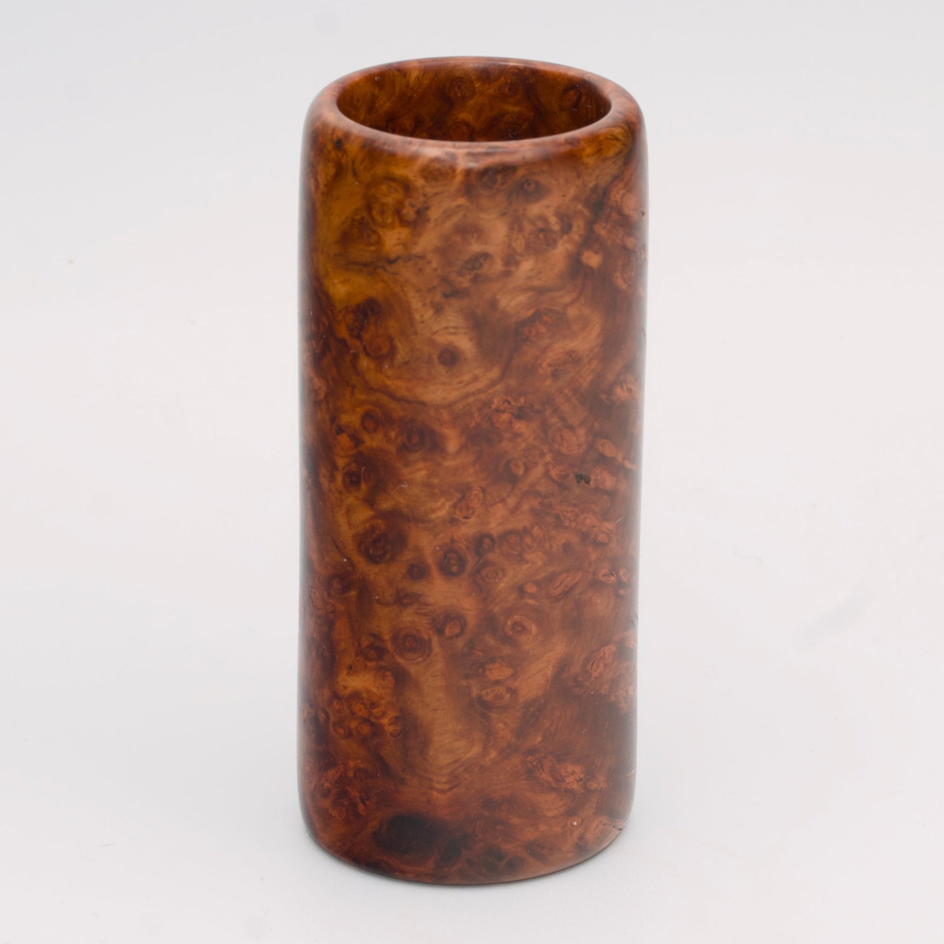 Big Leaf Maple Burl wood shot glass against white background