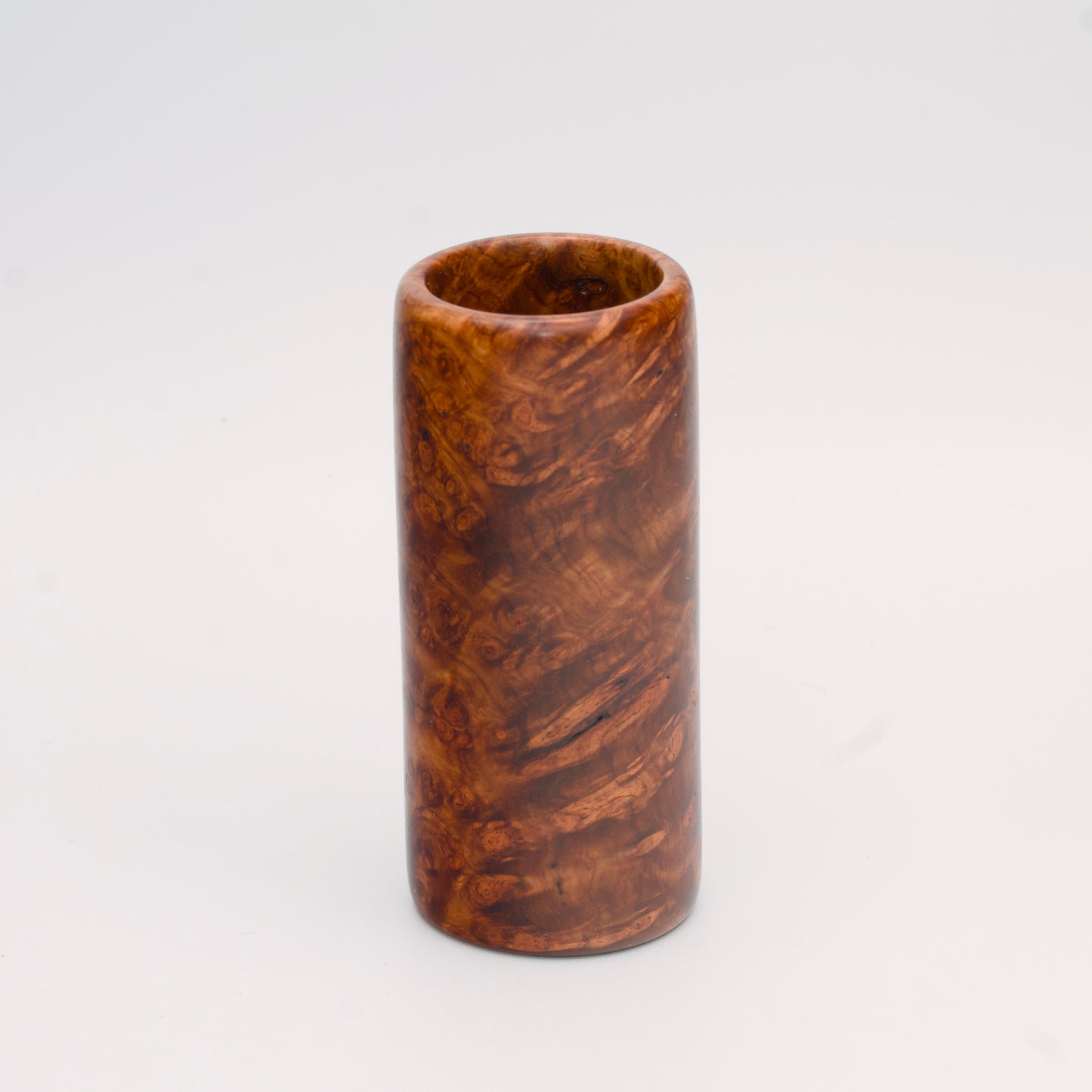 Big Leaf Maple Burl wood shot glass against white background