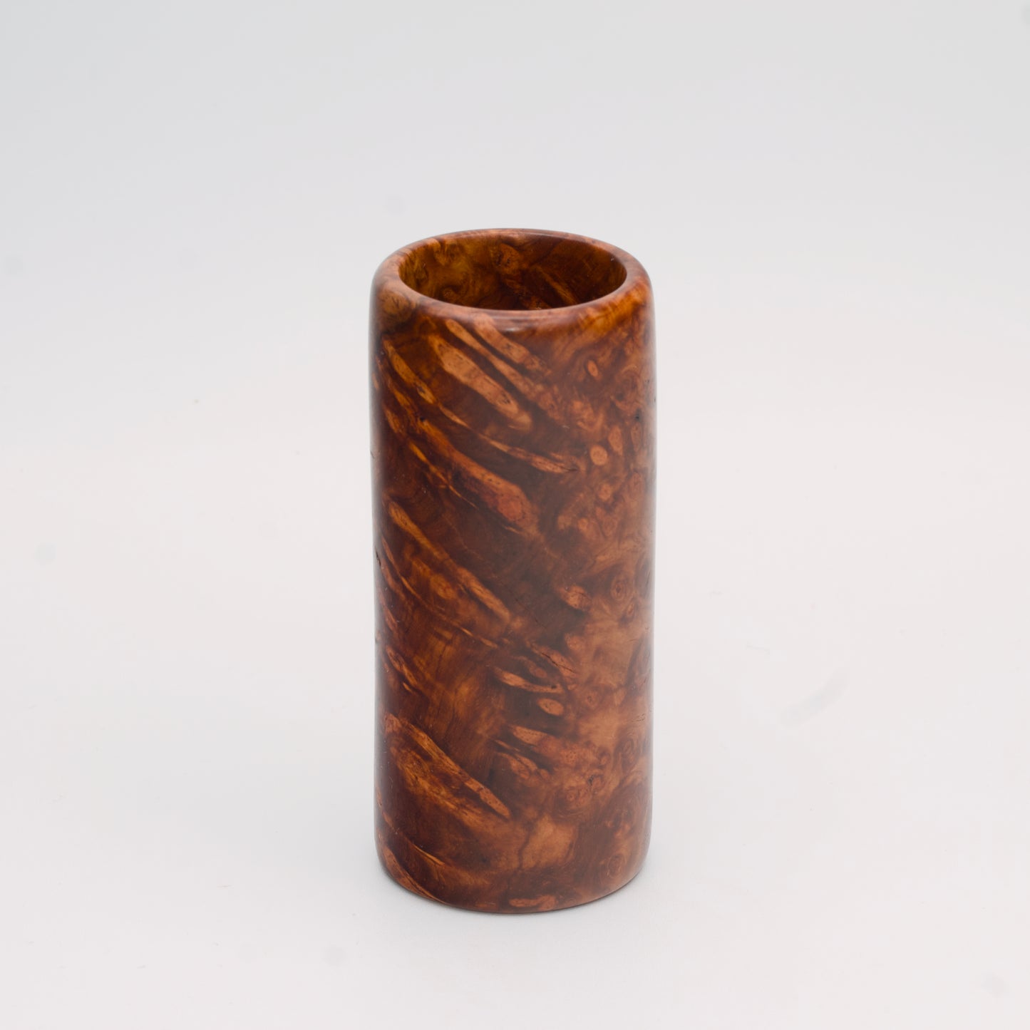 Big Leaf Maple Burl wood shot glass against white background
