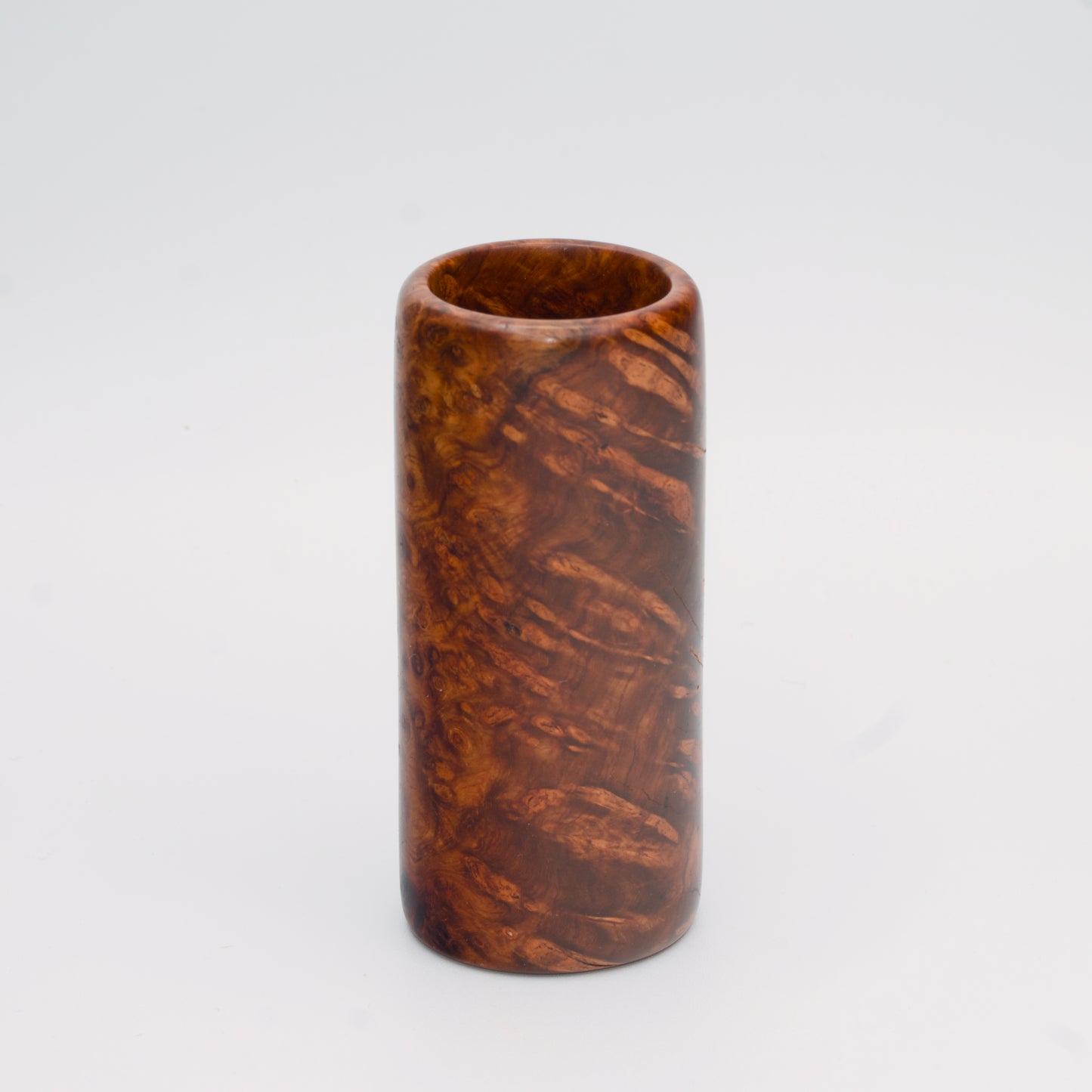 Big Leaf Maple Burl wood shot glass against white background