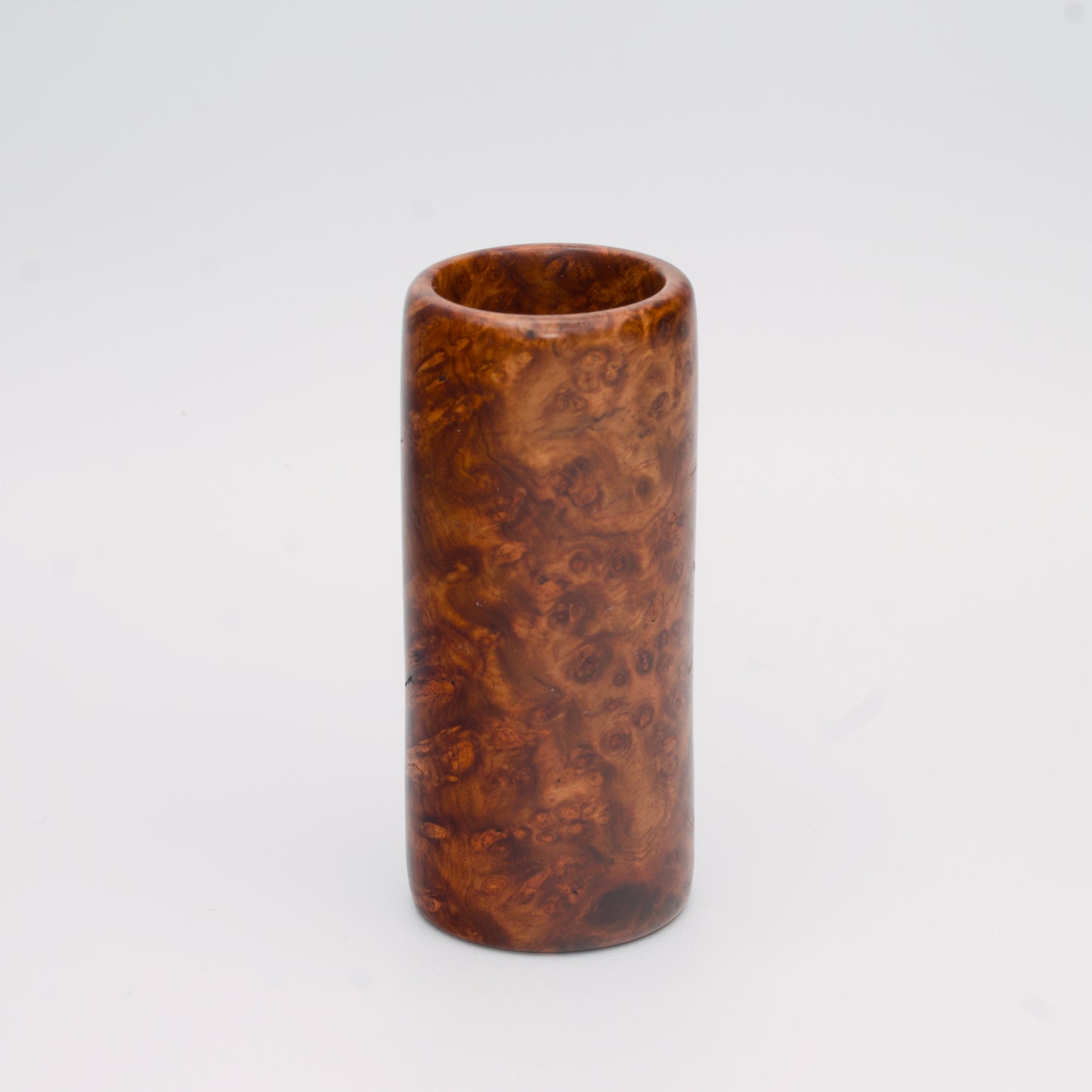 Big Leaf Maple Burl wood shot glass against white background
