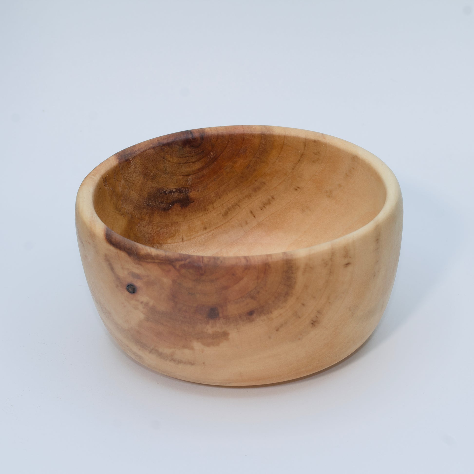 Wood bowl against white background