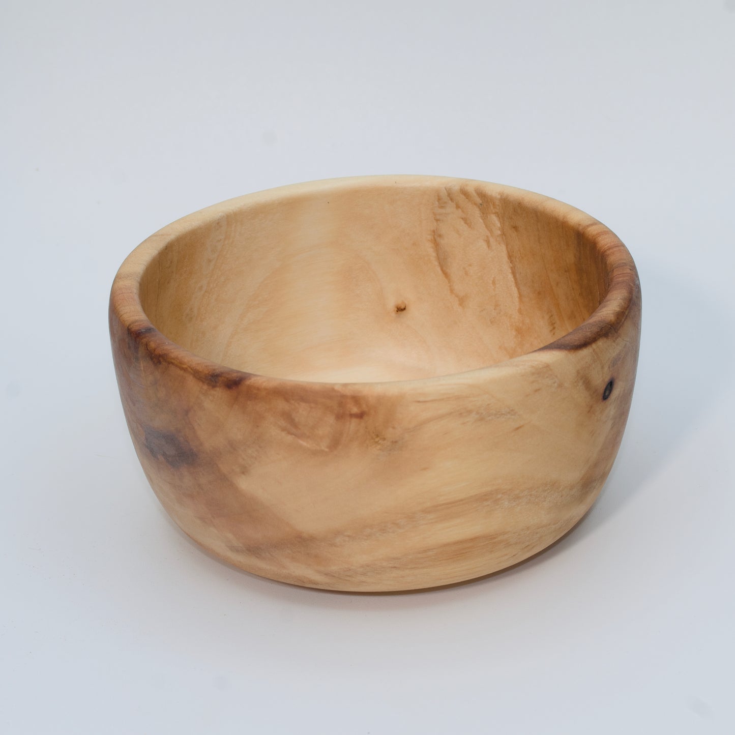 Wood bowl against white background