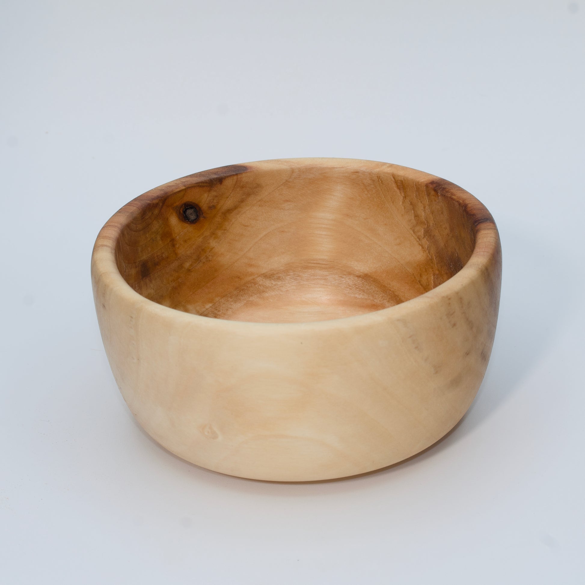 Wood bowl against white background