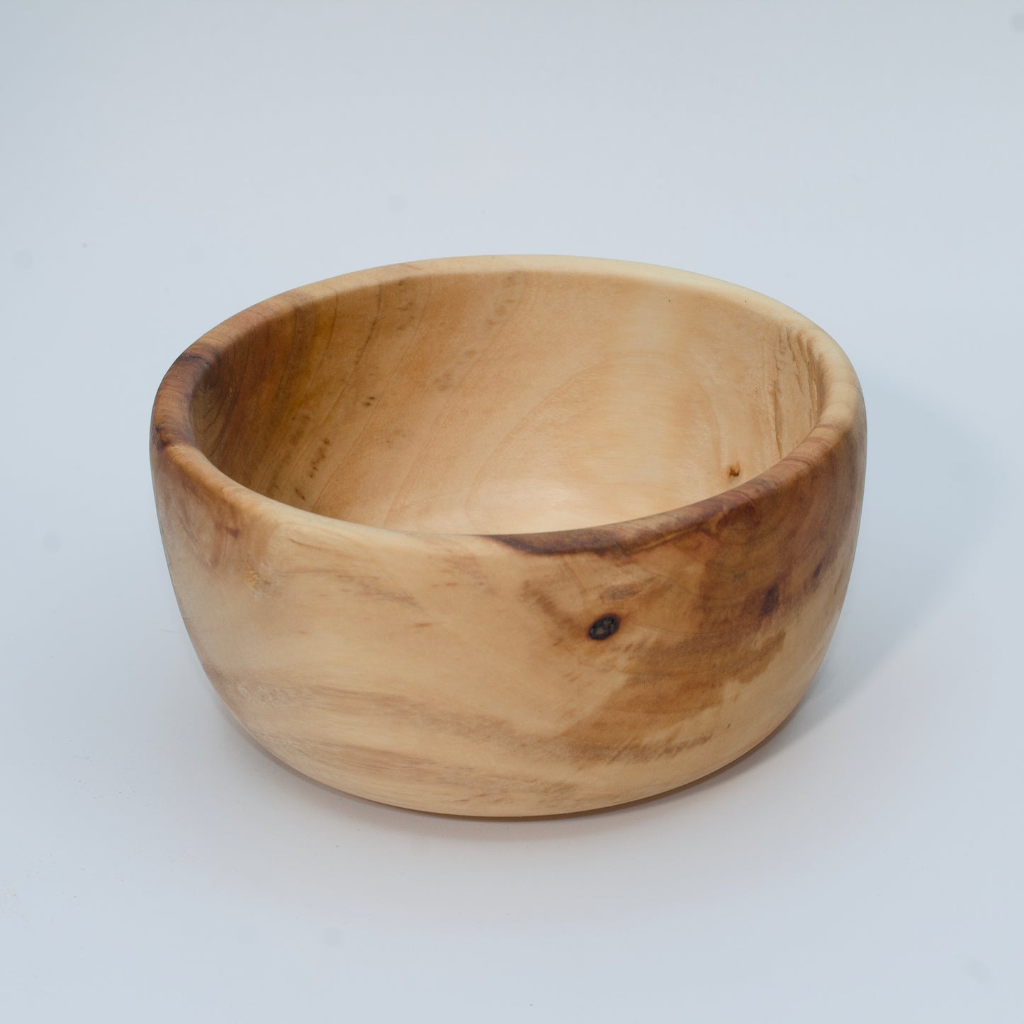Wood bowl against white background