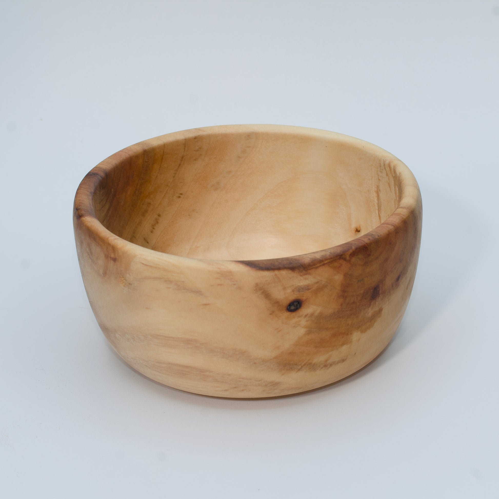 Wood bowl against white background