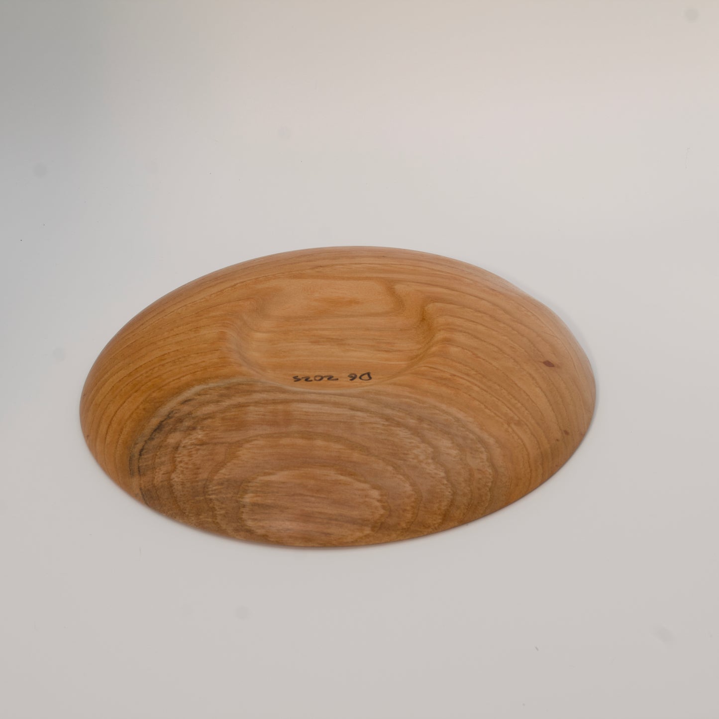 Wood bowl against white background