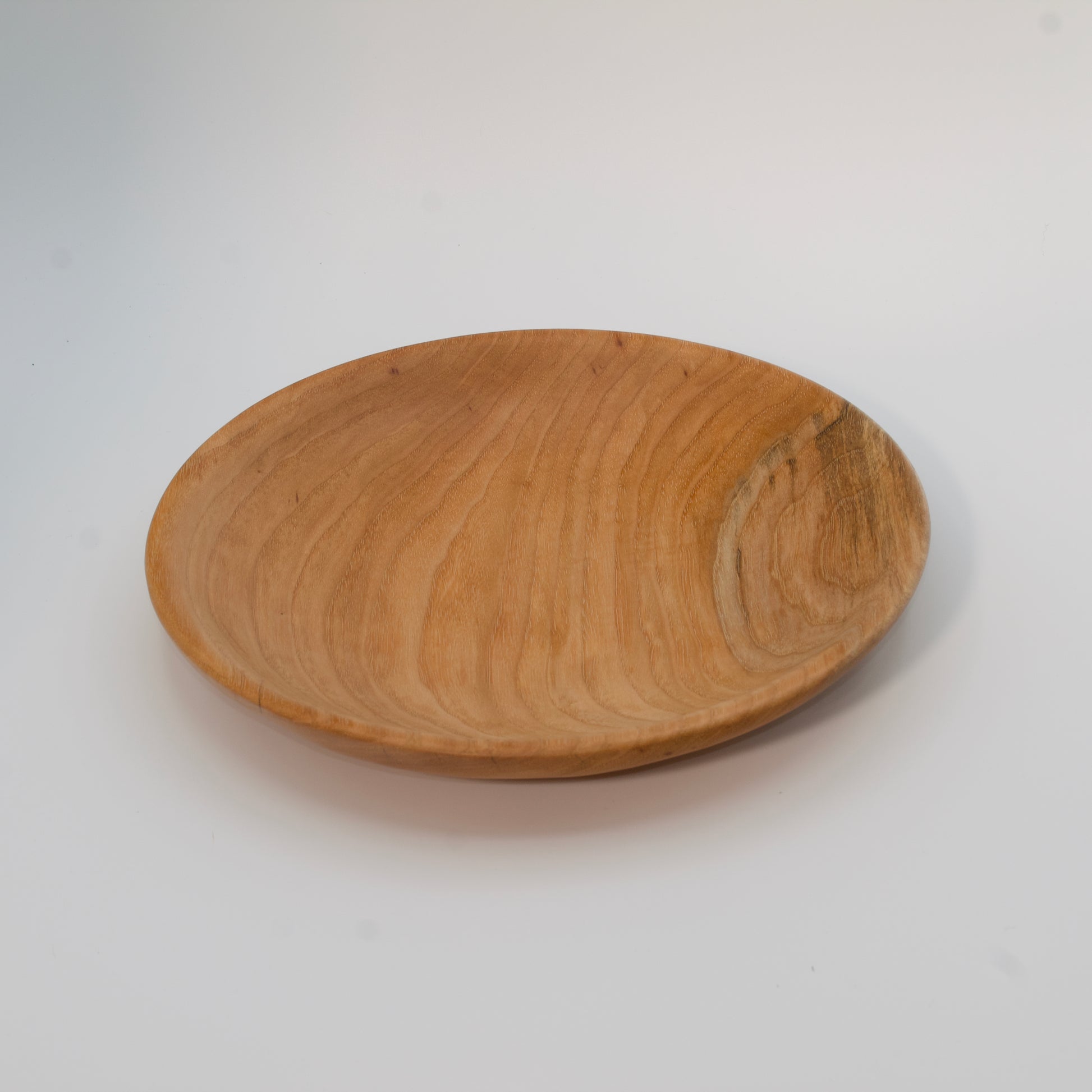 Wood bowl against white background