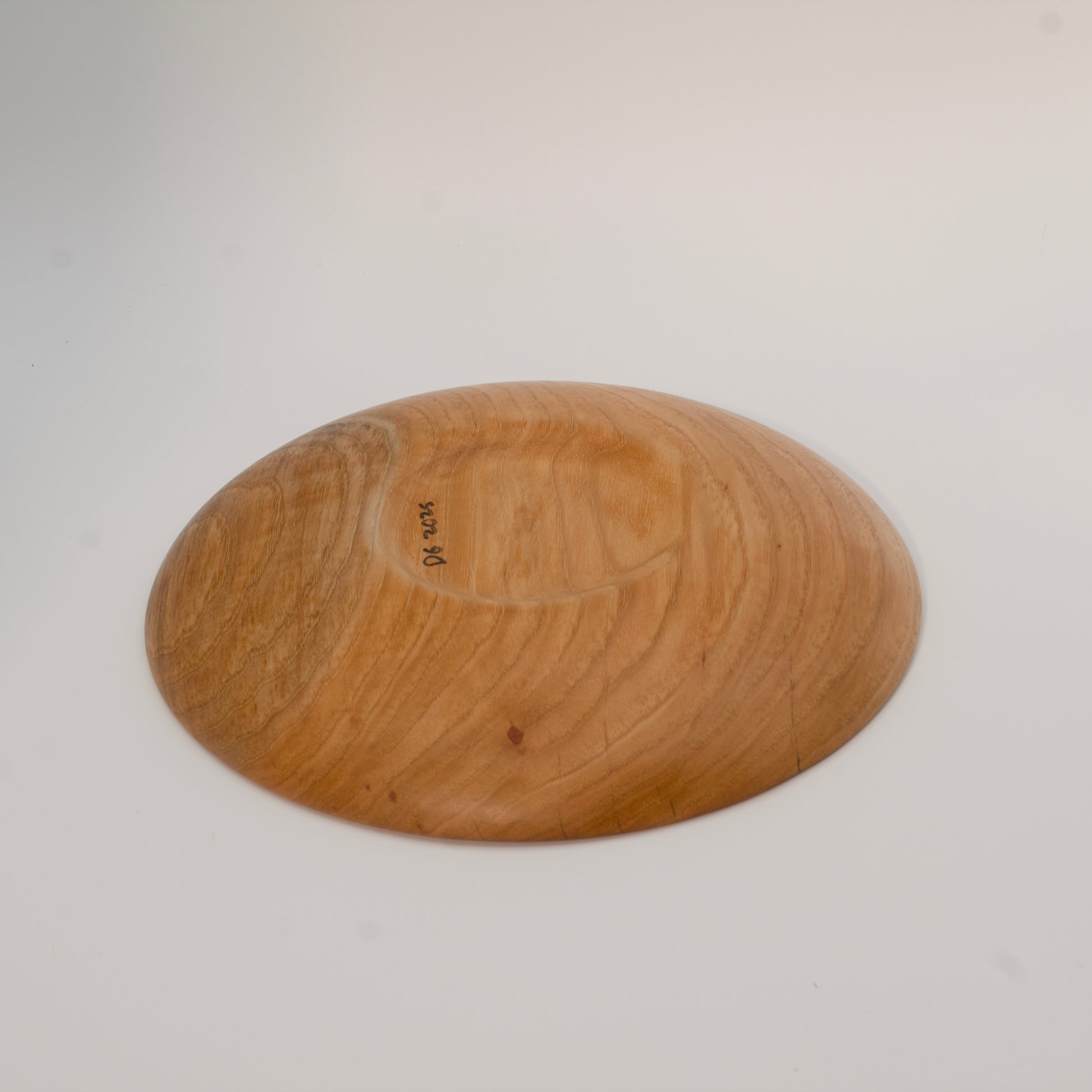 Wood bowl against white background