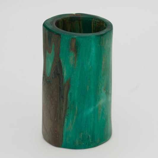 Green plains cottonwood shot glass on white background