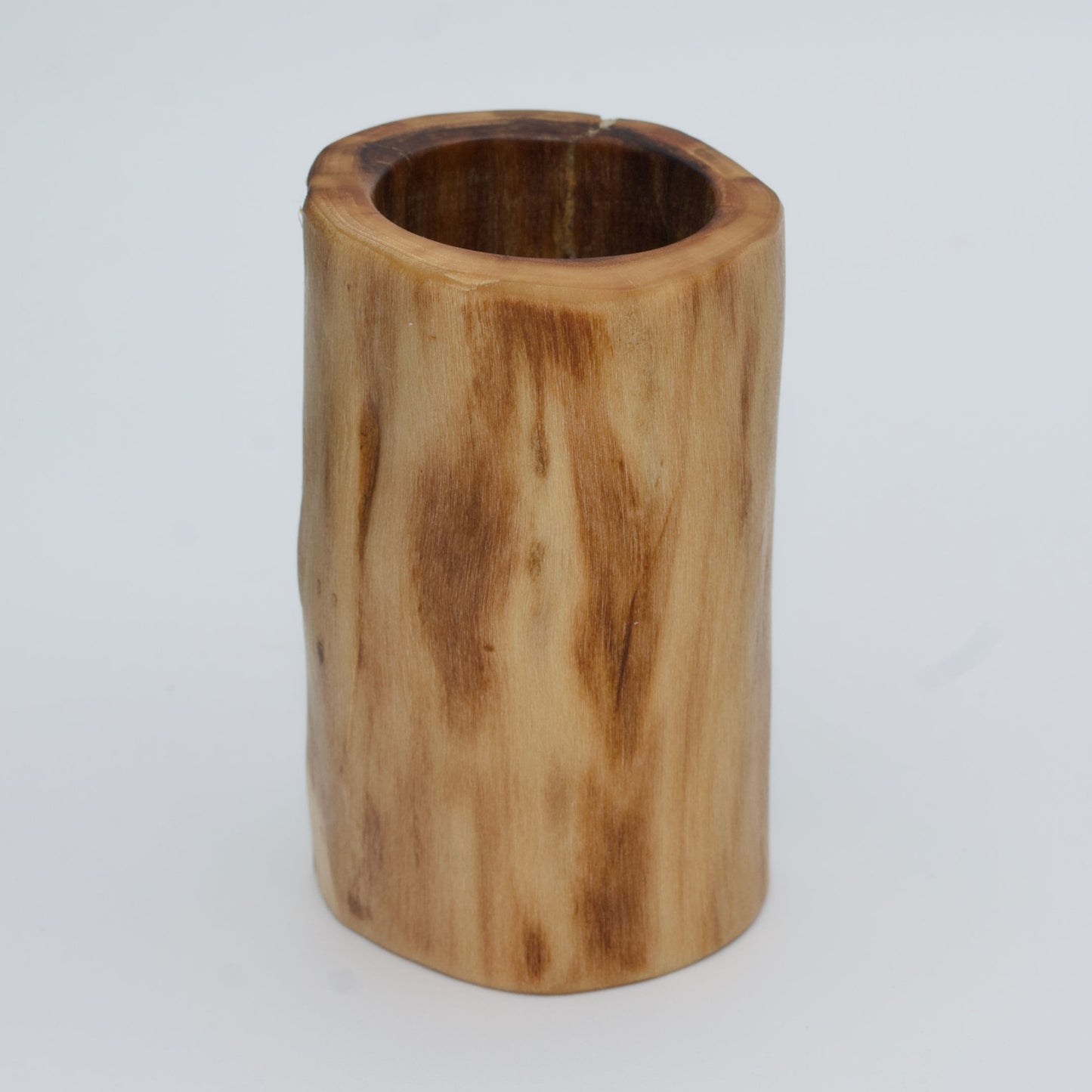 Plains cottonwood shot glass against white background