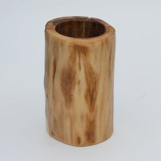 Plains cottonwood shot glass against white background