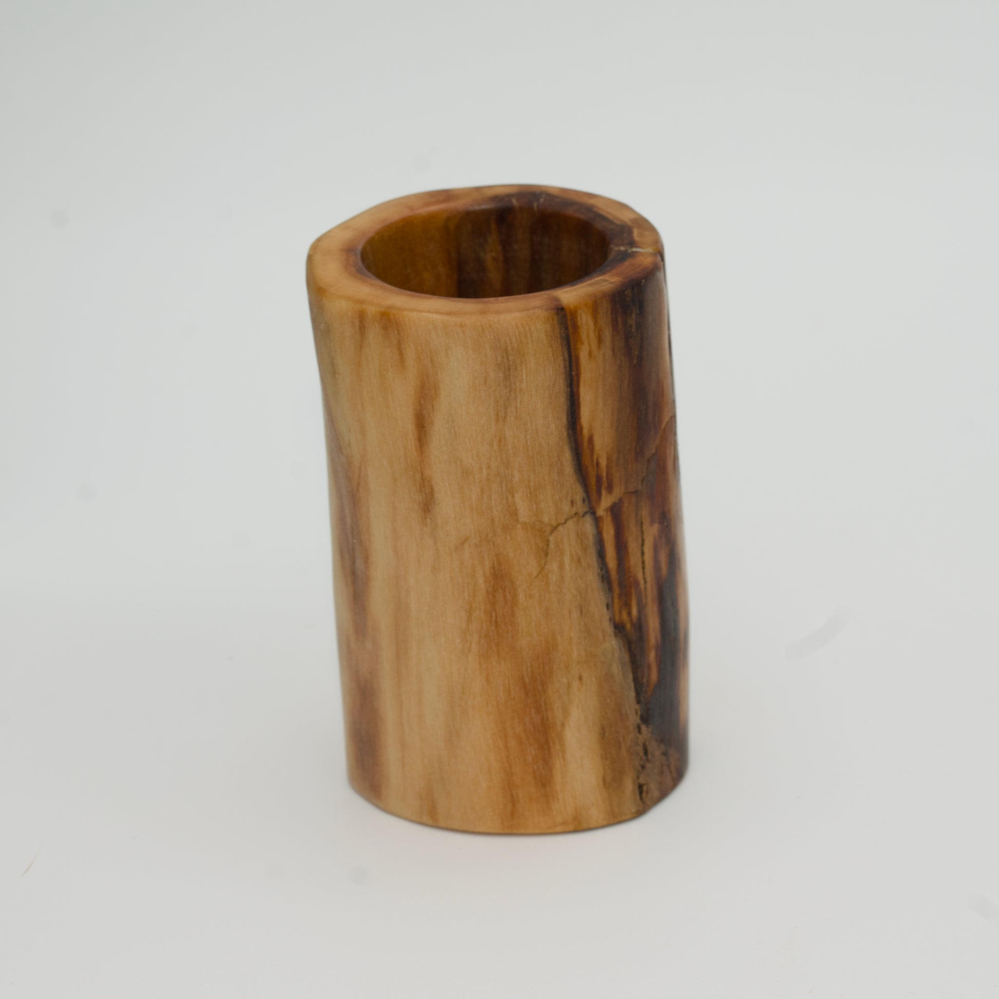 Plains cottonwood shot glass against white background