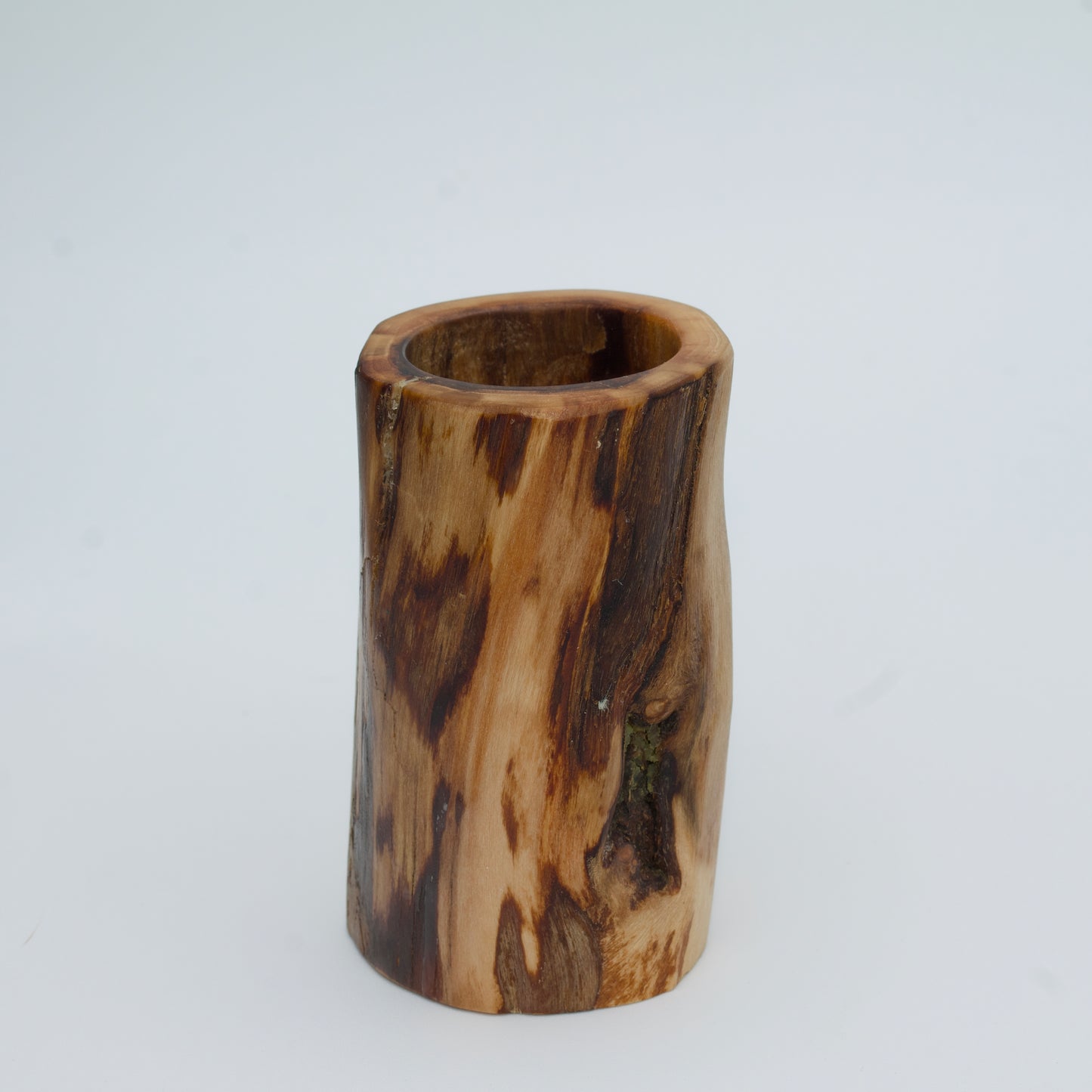 Plains cottonwood shot glass against white background