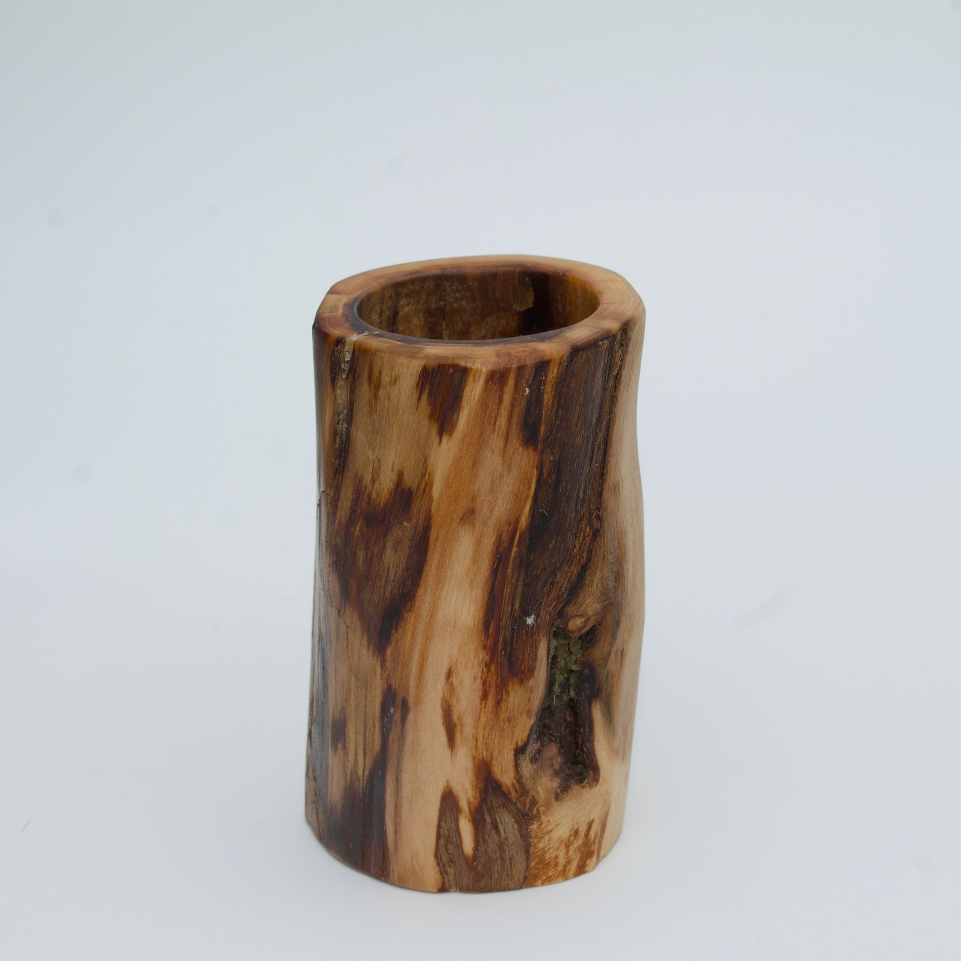 Plains cottonwood shot glass against white background