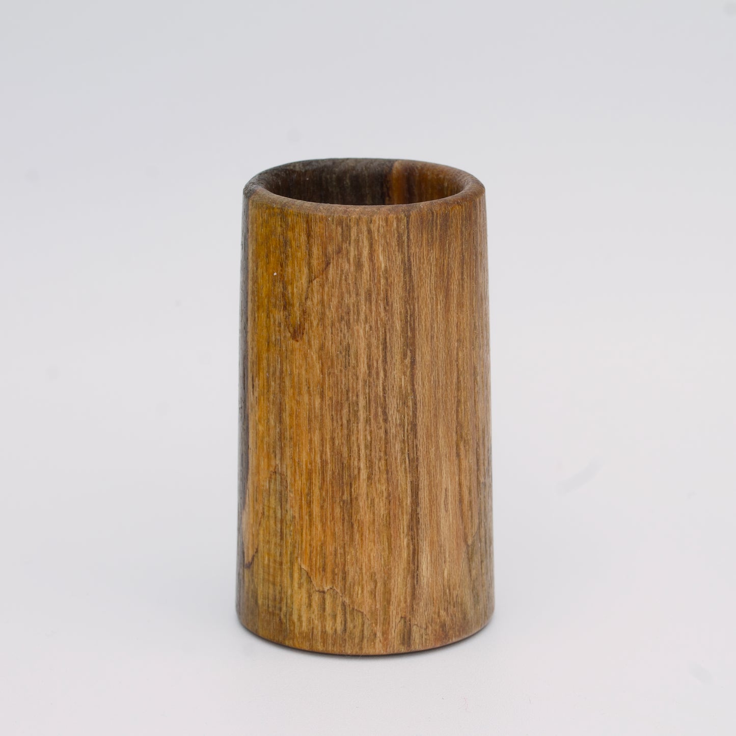 2 tone spalted silver maple wood shot glass against white background