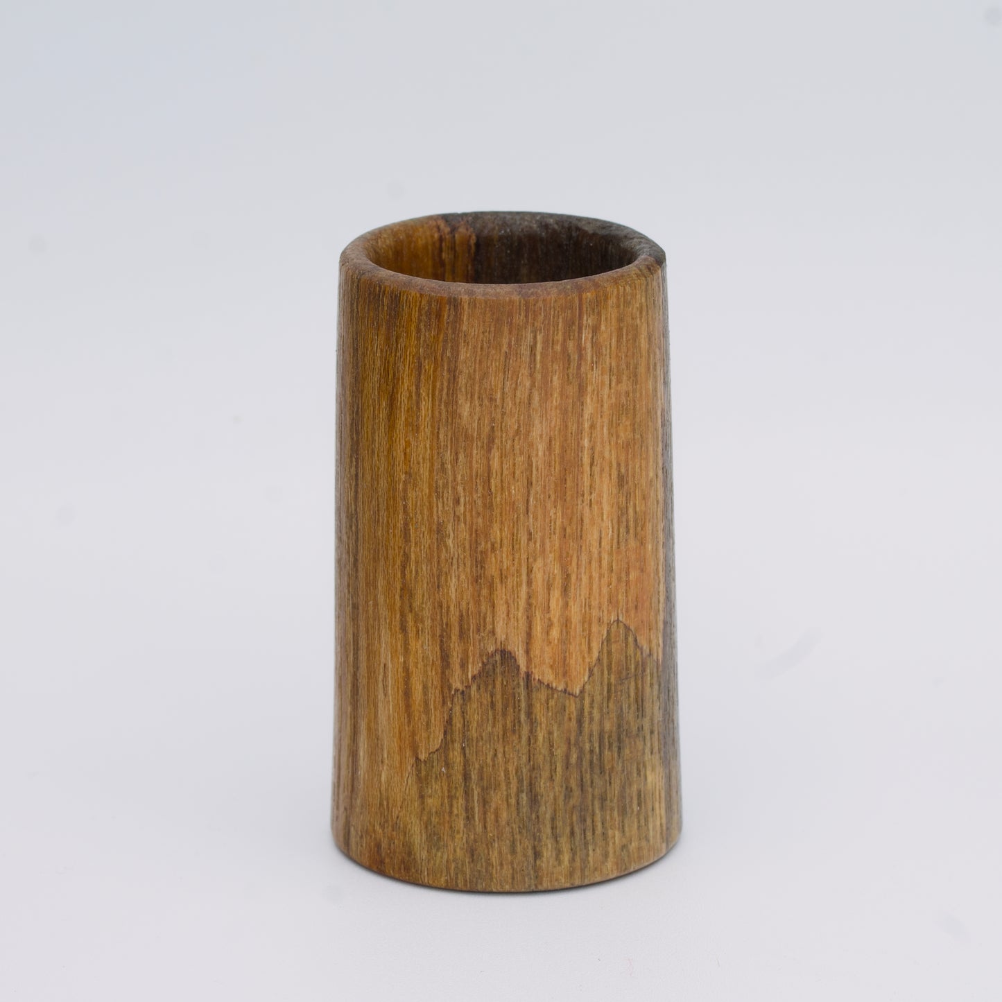 2 tone spalted silver maple wood shot glass against white background