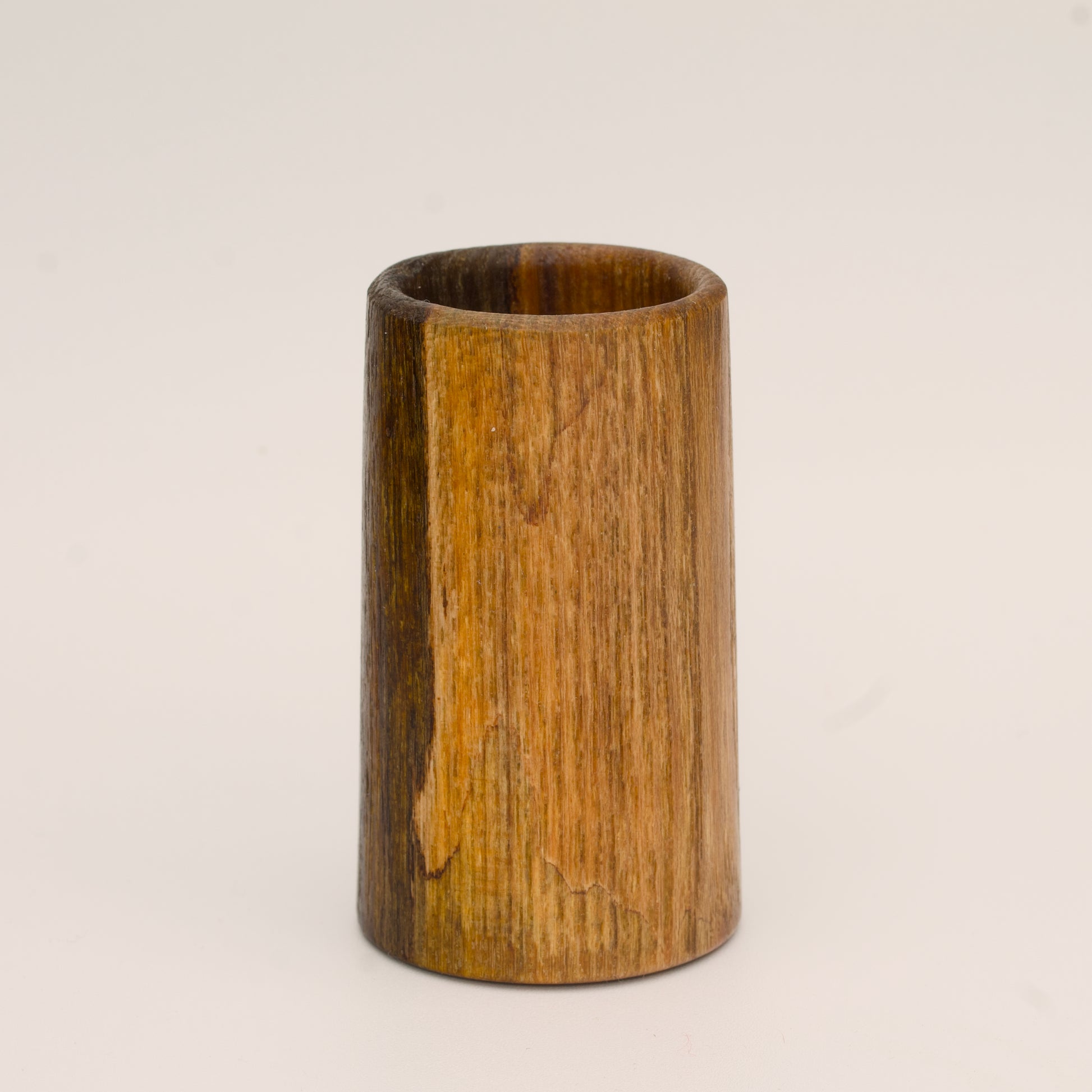 2 tone spalted silver maple wood shot glass against white background