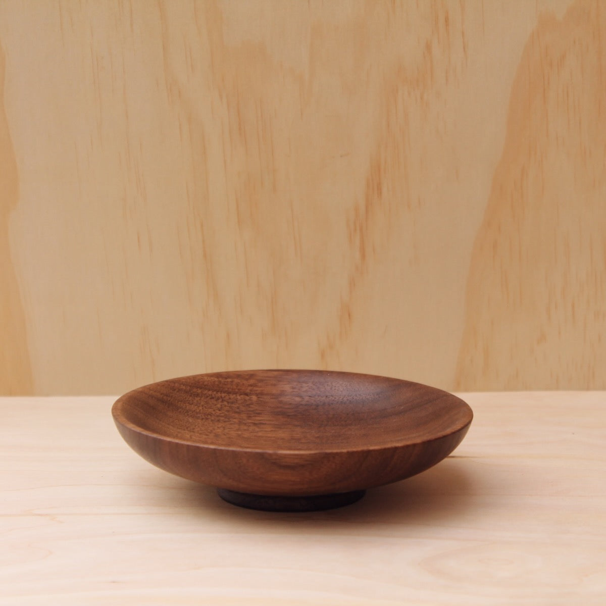 rich brown hand made wooden plate