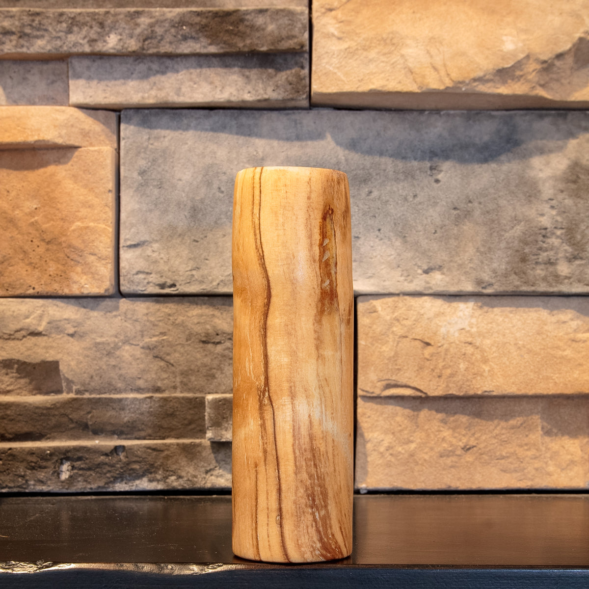 Side of The Gator spalted Live Oak shot glass showing long dark vertical spalting lines