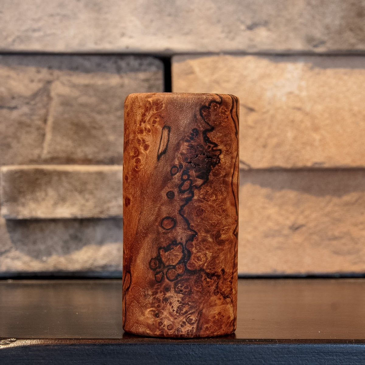 The Long Game showing clustered Bigleaf Maple burl eyes, dark natural spalting, and warm brown figure
