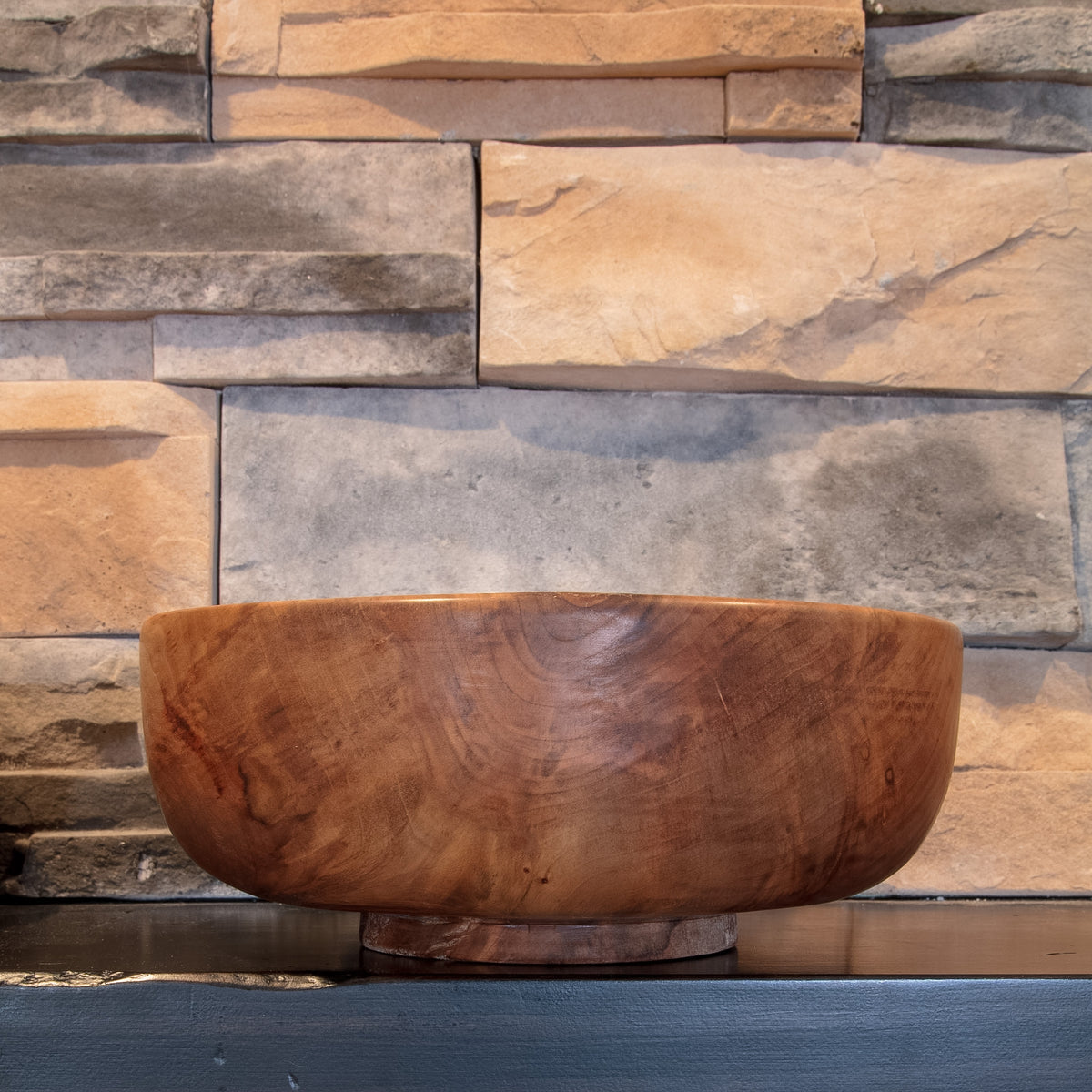 Alternate exterior of The Next Turn Sweetgum bowl showing darker figured grain and prominent natural knot figure