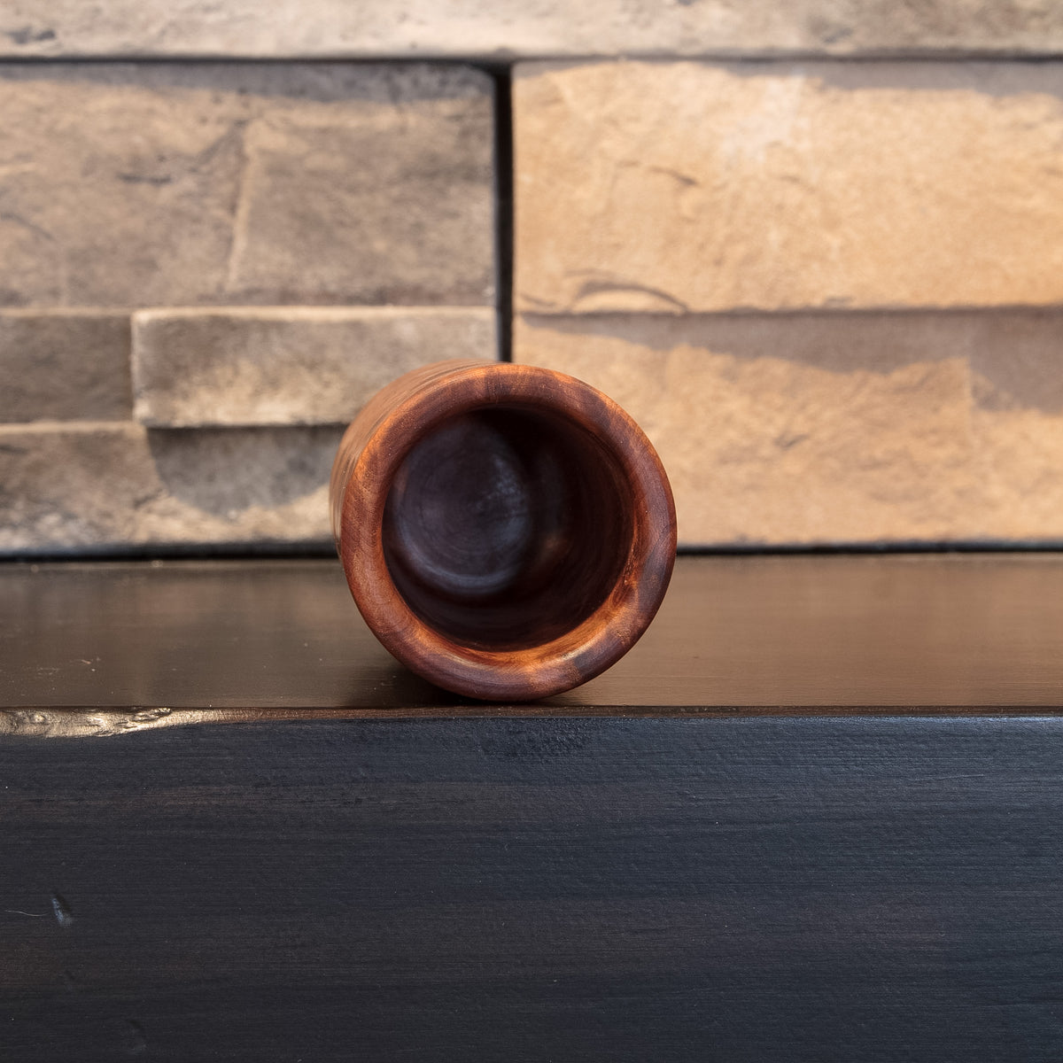 Opening view of The Scented Testament showing its rounded Thuya Burl rim and dark traditional interior