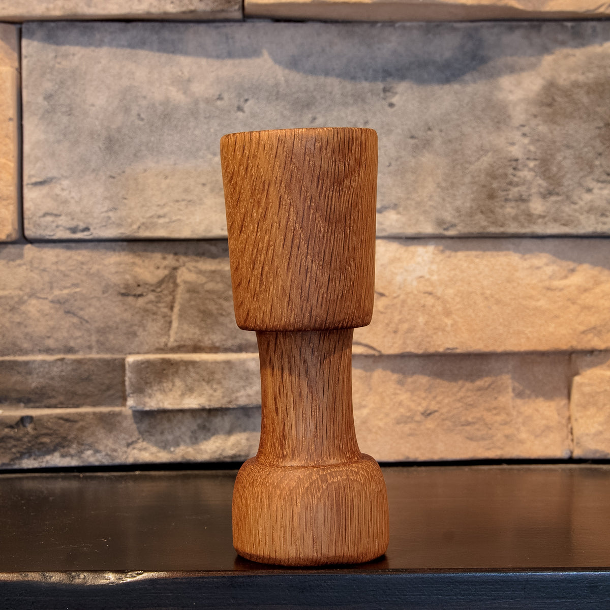The Witness White Oak turnabout vessel showing straight grain through both chambers and the narrow waist